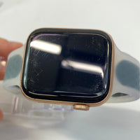 Unlocked Apple Watch SE 44mm Aluminum Gold Clear Band
